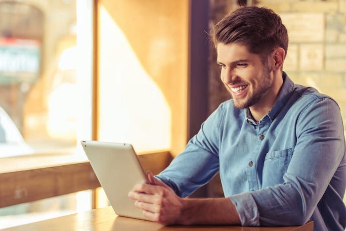 In-Mobility Businessman is using tablet